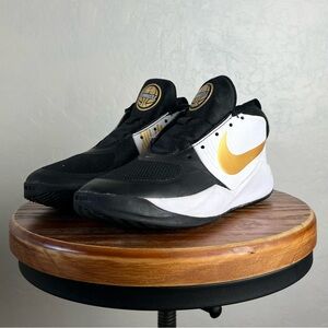 SOLD Nike Team Hustle D9 Youth Black White and Gold Sneakers